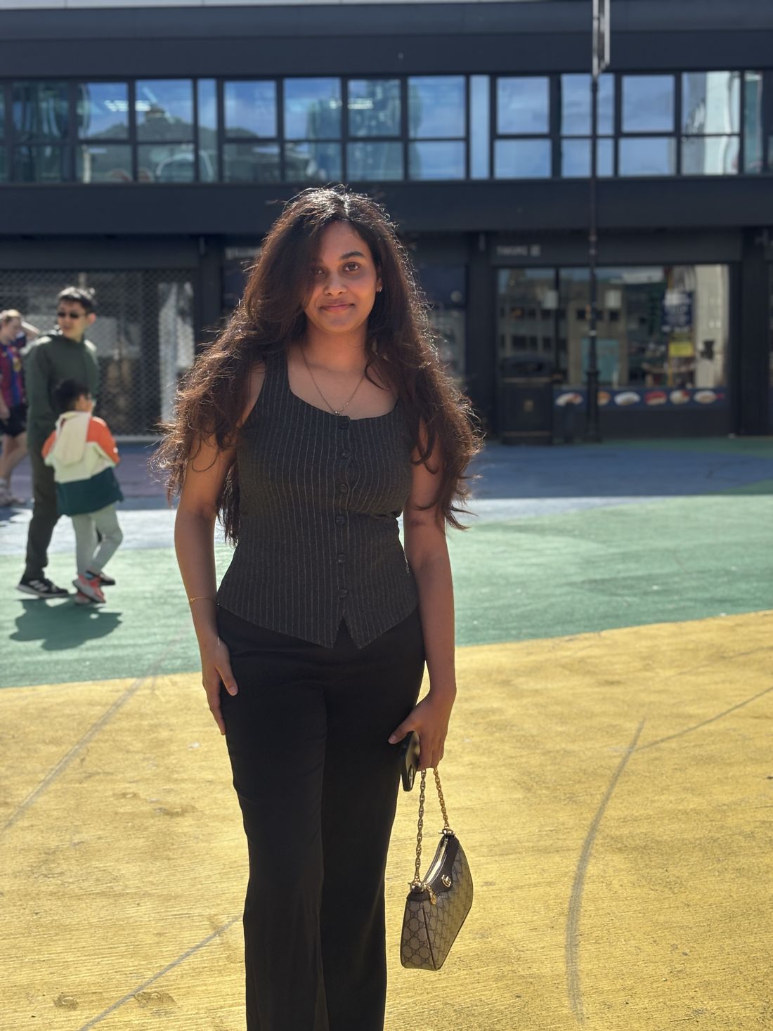 Bindushree standing in a city square